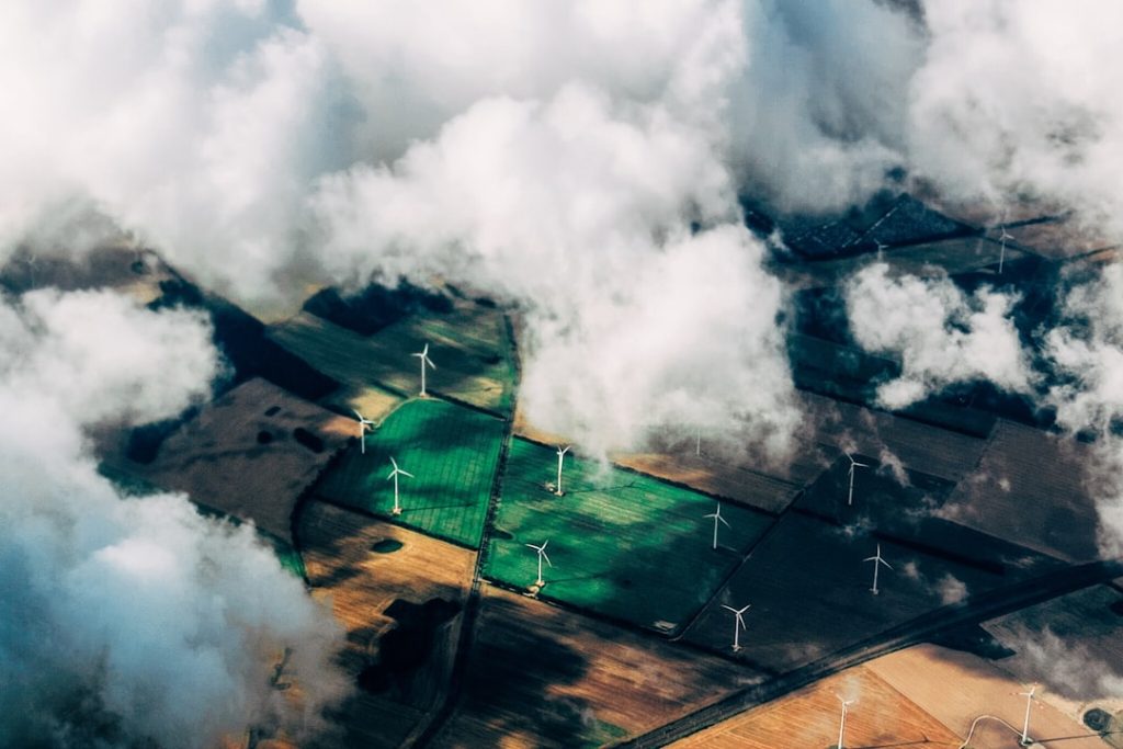 aerial photo of wind turbines near field aerial photo of wind turbines near field